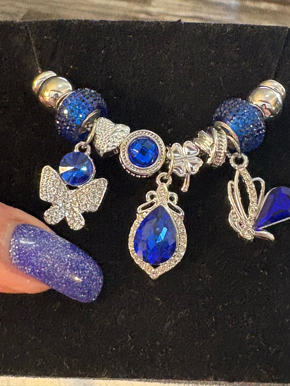 Bracelet- Silver Tone Alloy Charm Bracelet that has extensions for size Royal